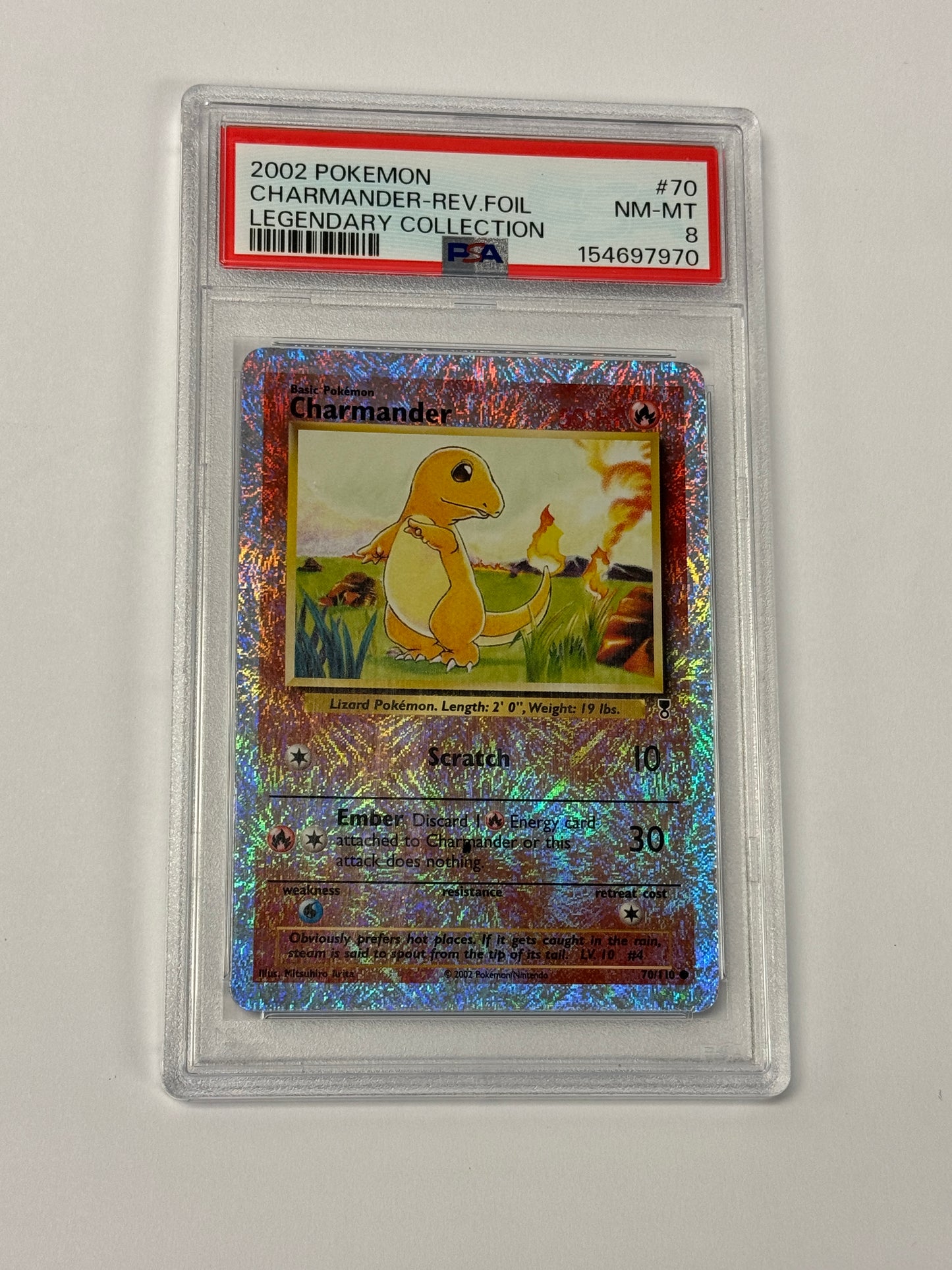 2002 LEGENDARY COLLECTION CHARMANDER REVERSE HOLO #70  PSA 8  PK994.  SLAB